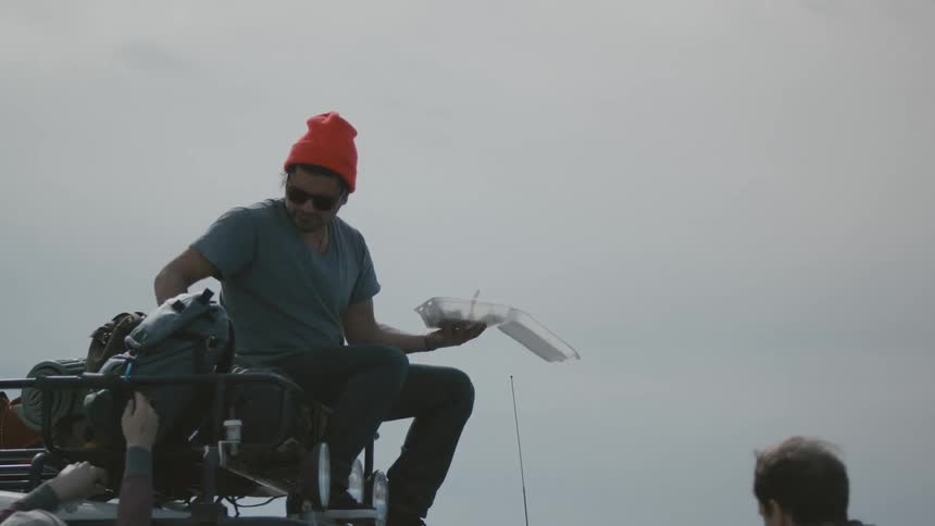 A person sitting down to eat