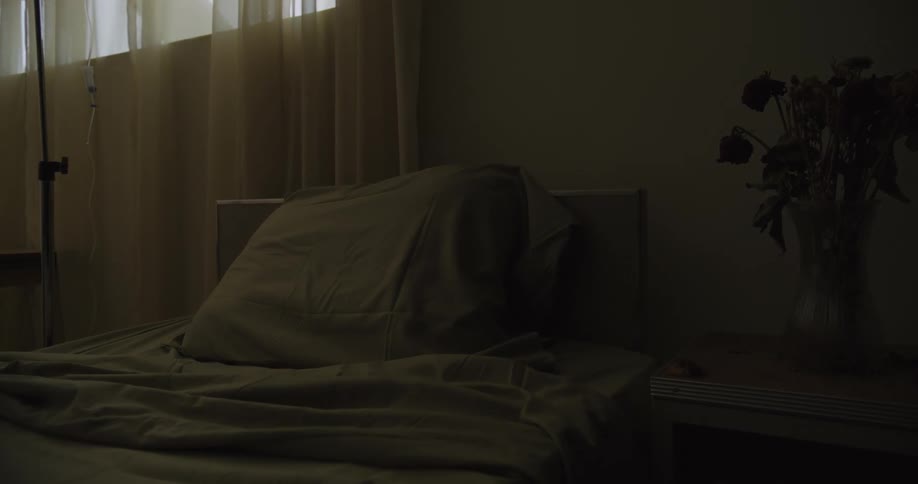 An empty hospital bed