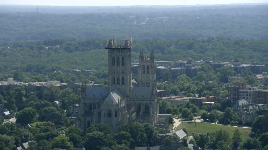 A large building lies in the middle of this town ahead