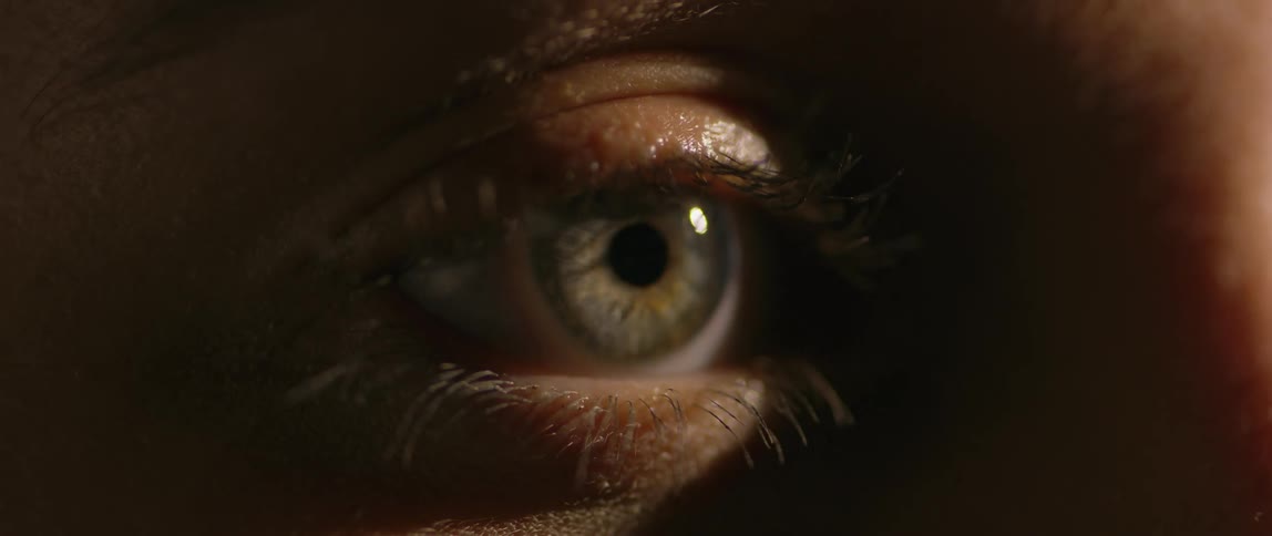 Green eyes opening and blinking