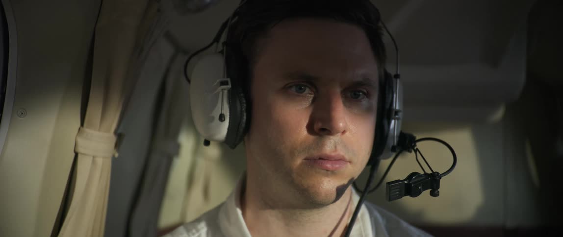 A pilot flies the plane