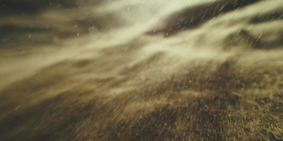 The sand is being blown into hills during the storm