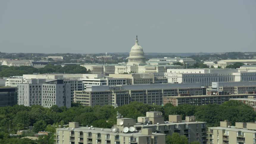 The city ahead is full of large buildings