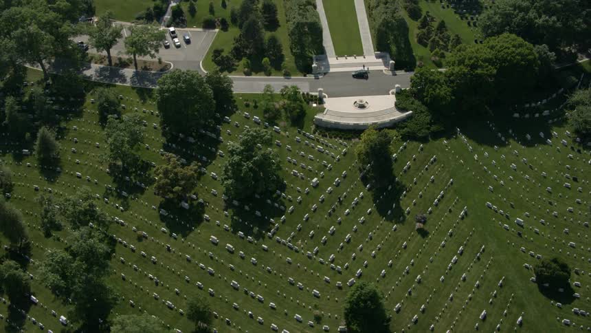 The cemetery below has many graves
