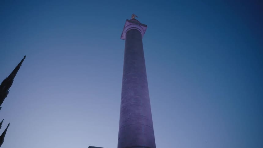 Bottom view of a tower against the sky in daytime