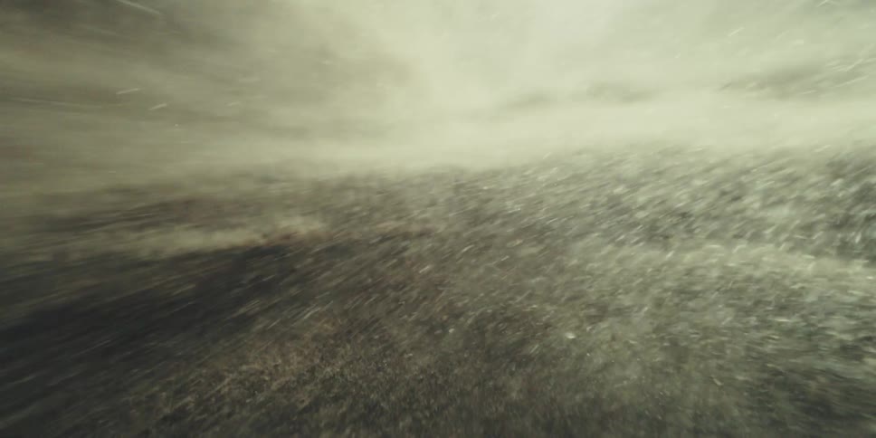Riding a Violent Wave of Sand as Dust Lifts From Shifting Peakss