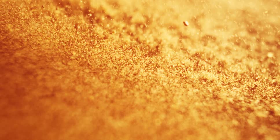 Golden Particles Dancing Across a Quaking Abstract Surface