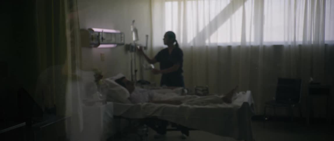 A nurse is checking up on her patient