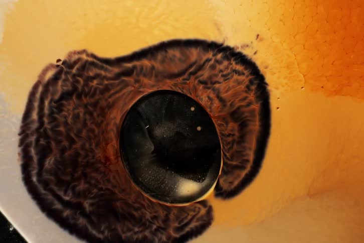 Dense abstract liquid in motion