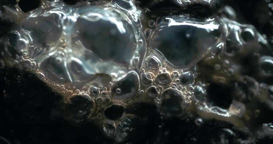 A sticky substance foaming and creating air bubbles