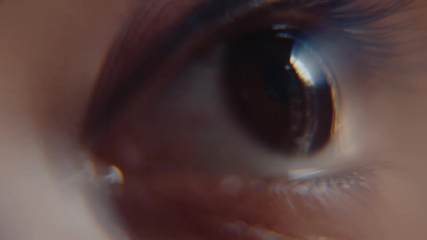 Close up of a womans eye as she blinks