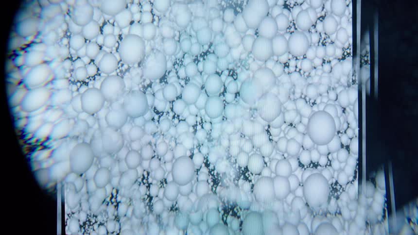 Abstract fractal of thousands of white dots against a black background