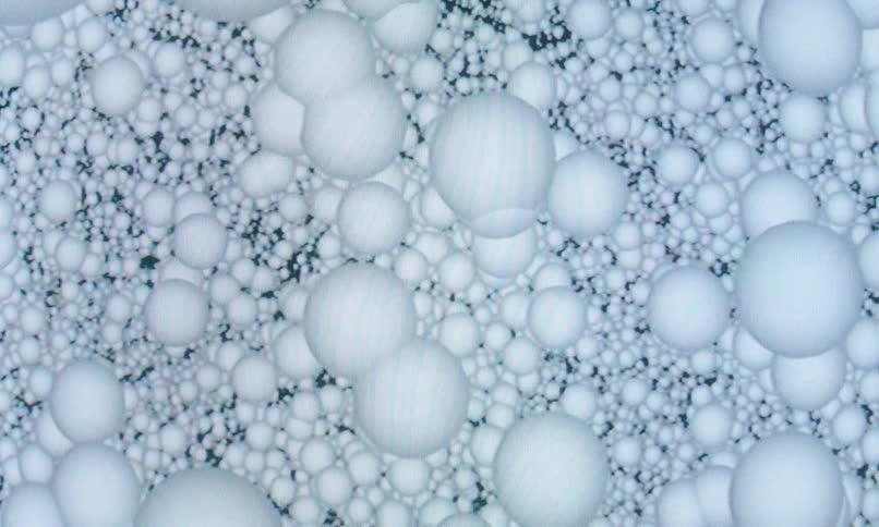 A clip of falling white bubbles