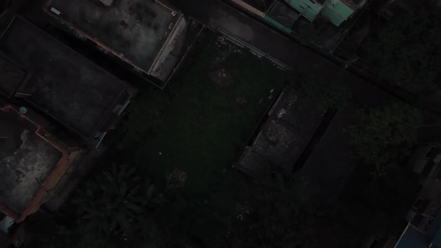 Aerial of abandoned suburban area at sunset