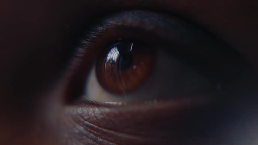 A persons eye looks around
