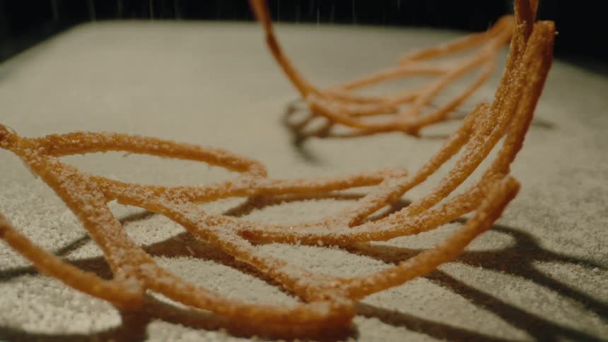 Composition of an abstract food being sprinkled