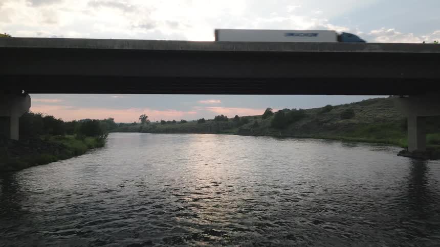 Under a bridge and along a river