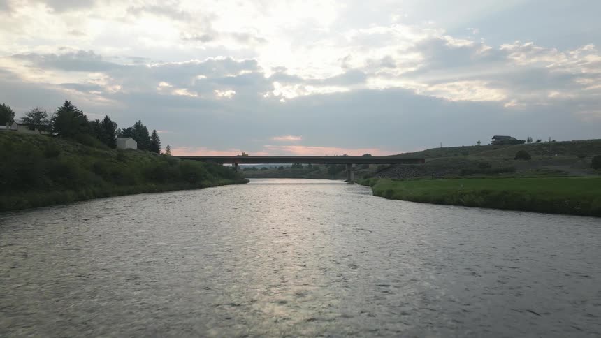 A river runs under a bridge