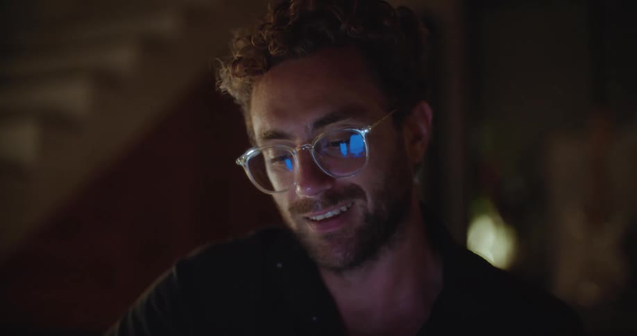 Man with glasses with happy expression