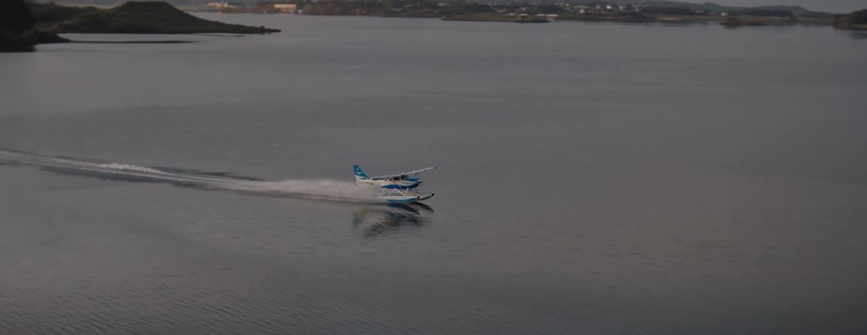 Water plane landing on a lake