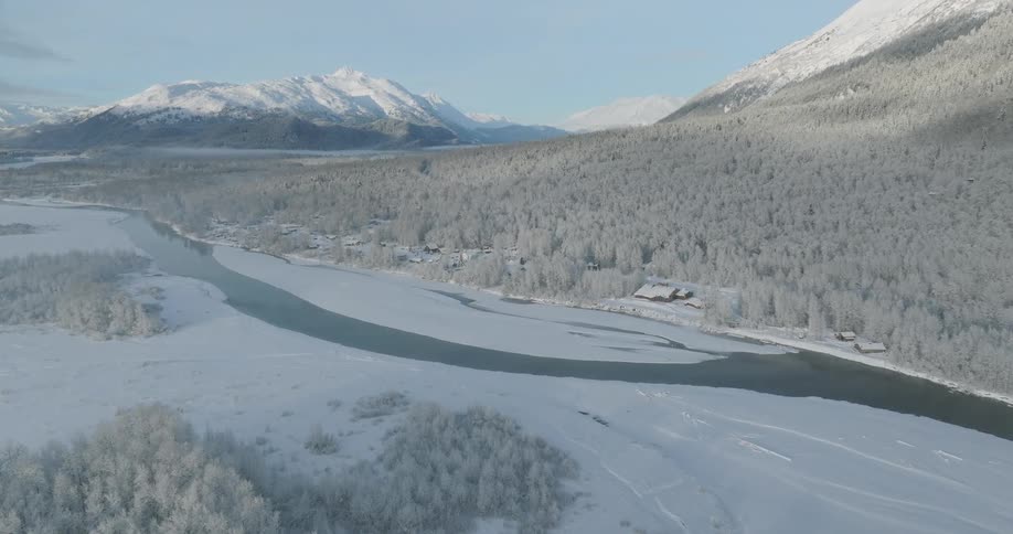 Aerial shot of mountain range in winter
