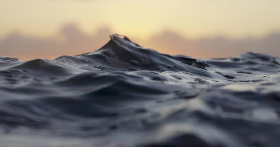 Ocean waves in the sunset light