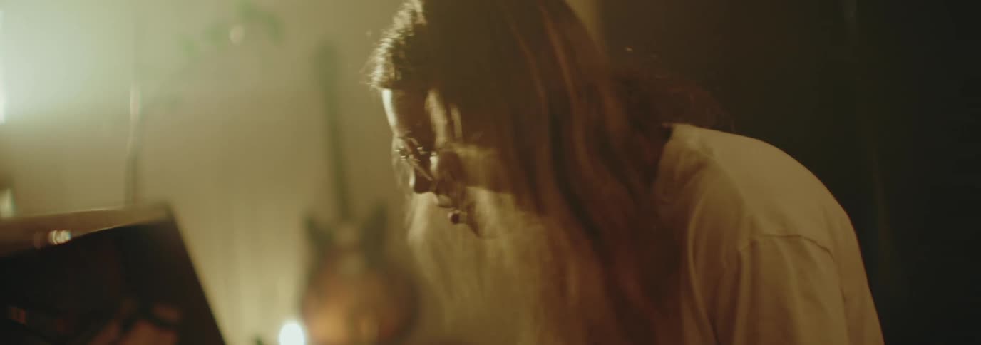 A man is playing the piano