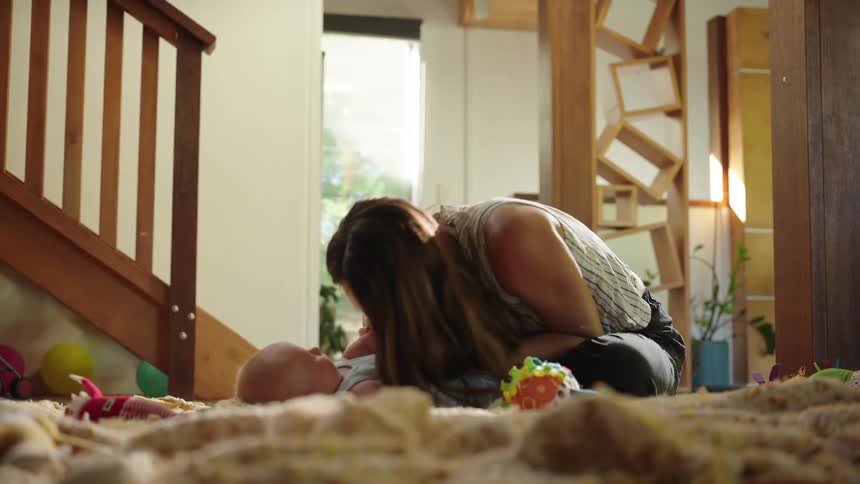 Mother playing with child