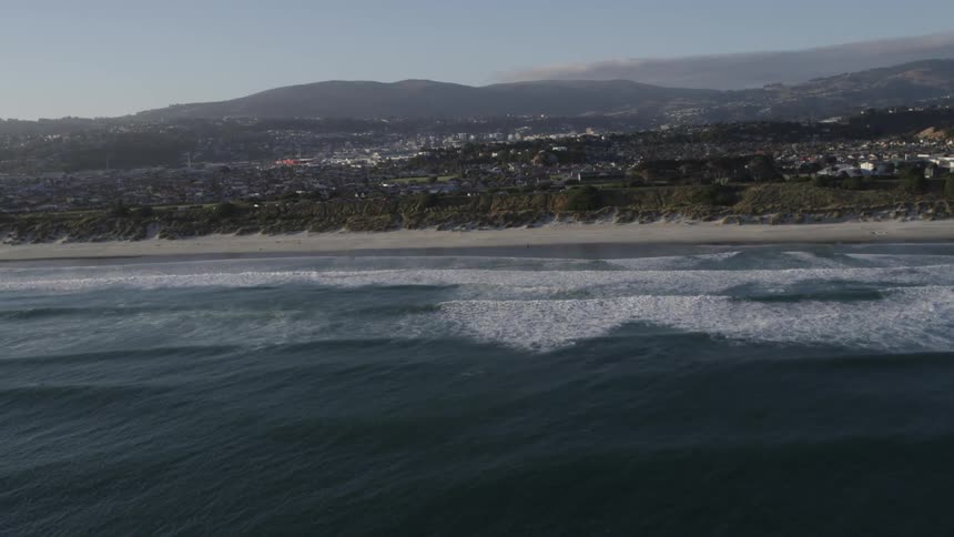 Waves crashing against the beach