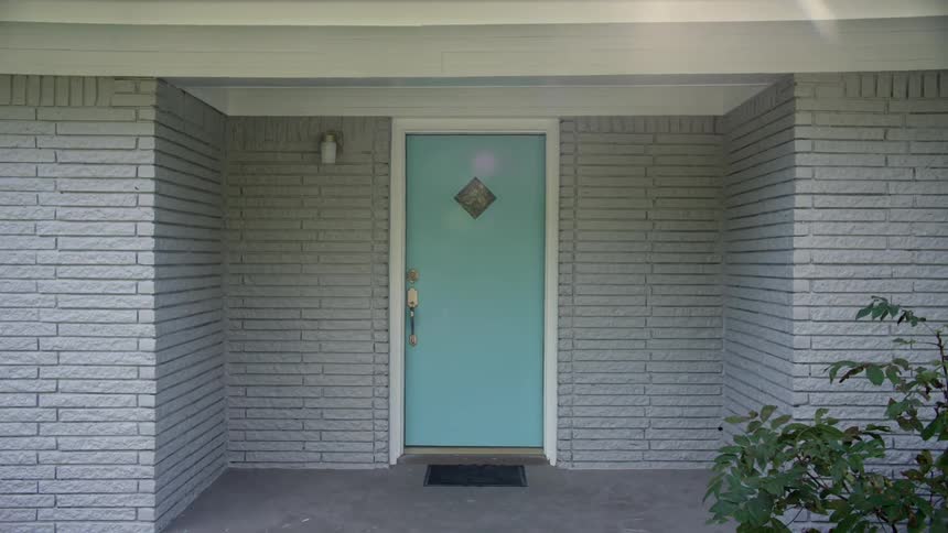 The door to a home is painted blue