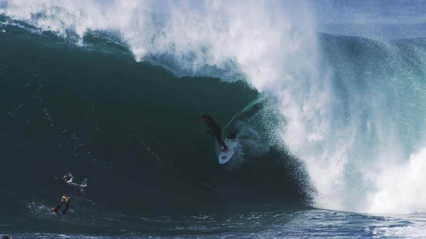 Person surfing a wave