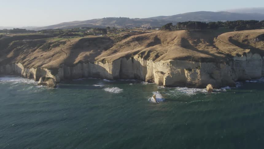 A rocky jagged cliff side
