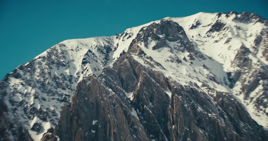 Imposing mountain covered in snow