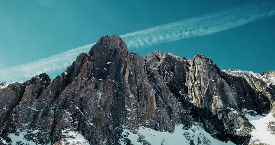 Mountain cliffs against a blue sky