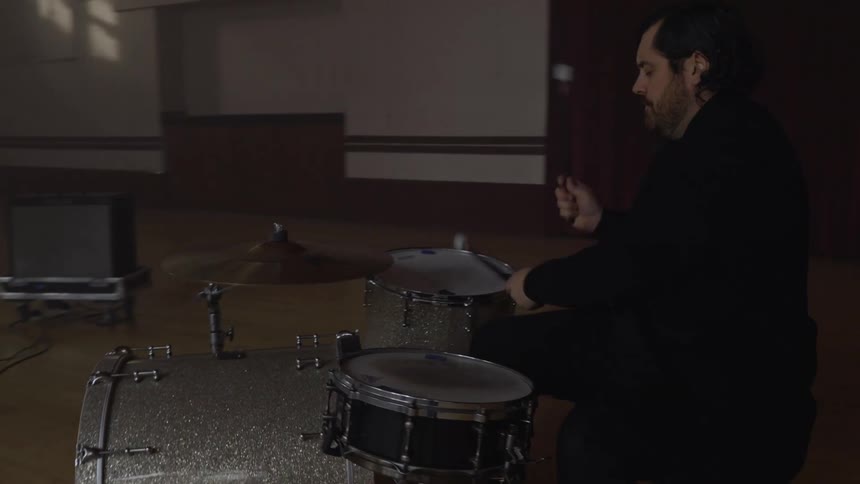 Drummer in a rehearsal with a musical band