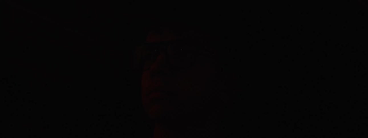 Lights flash on the mans face