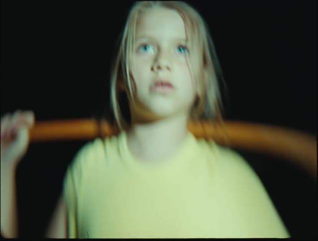 A close up image of a female weight lifting