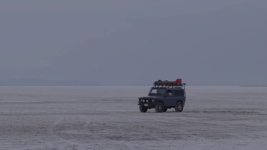 A jeep driving in the desert
