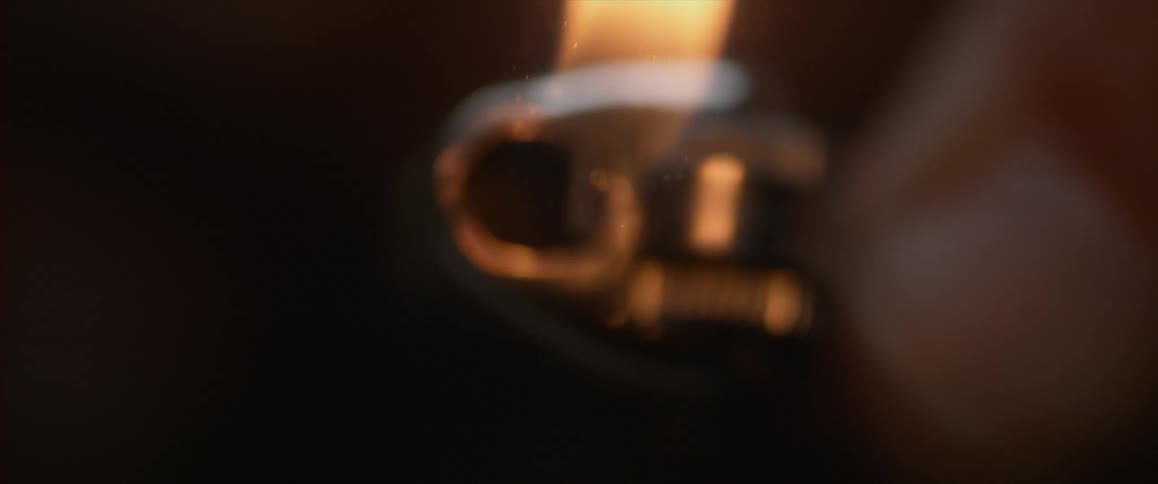 A person sparking a lighter