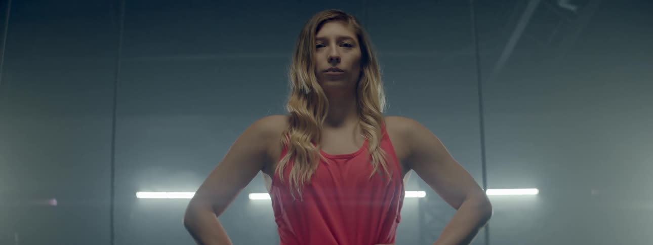 Woman standing with hands on her hips