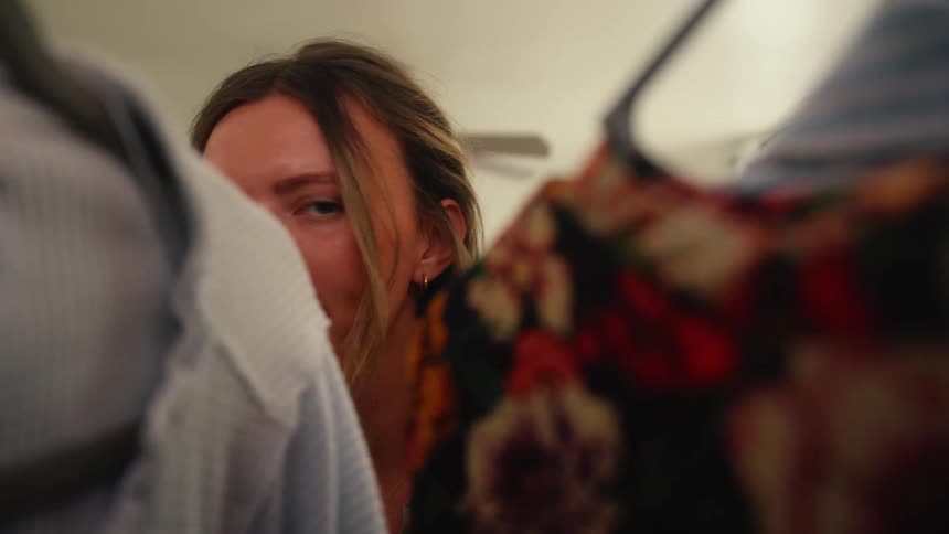 Woman choosing clothing