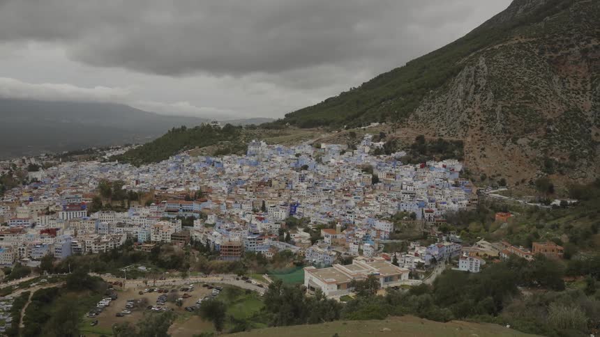 Landscape of an urban and picturesque city at the foot of a mountain
