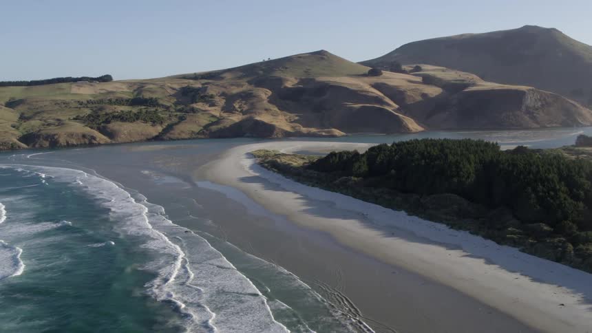 Waves crashing against the beach