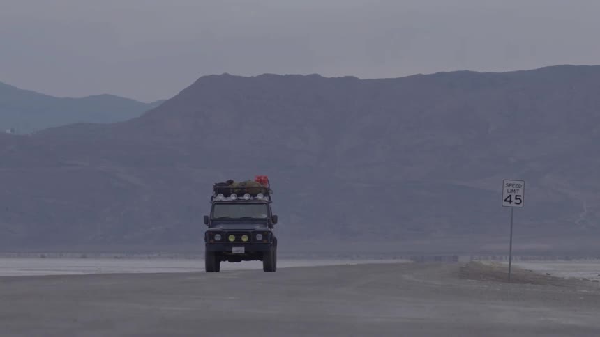 A jeep driving towards the camera