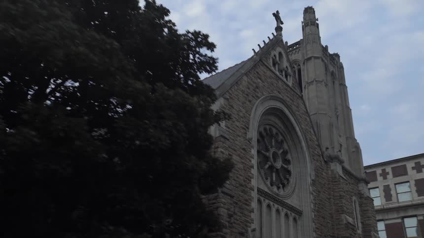 Driveby view of the exterior architecture of a suburban church