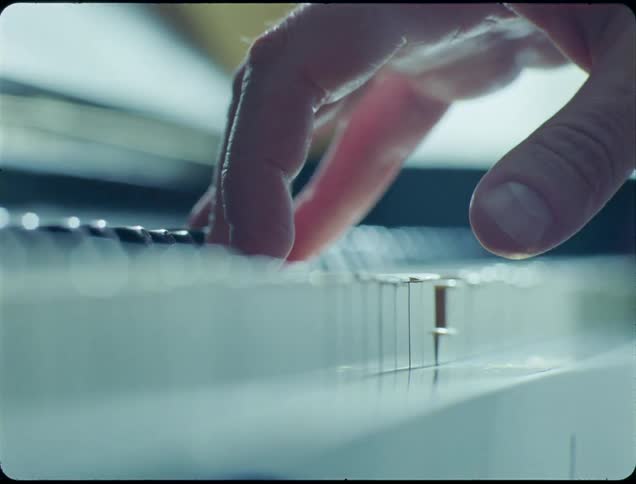 A person is playing the piano