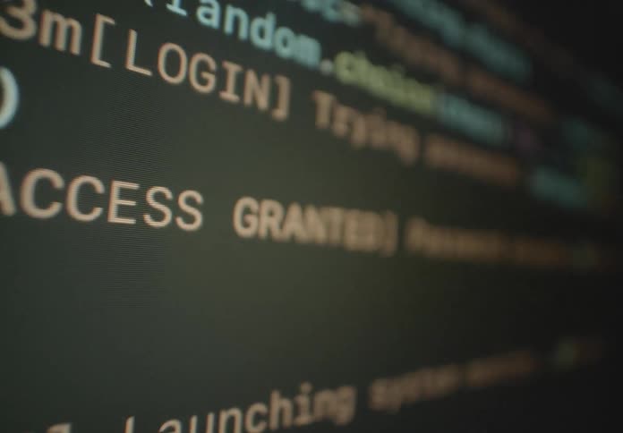 A computer screen displays programming language code