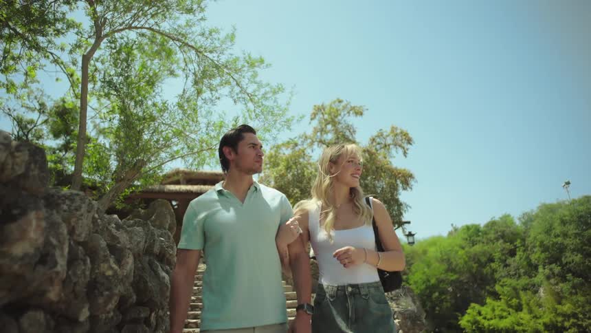Tourists talk as they walk around