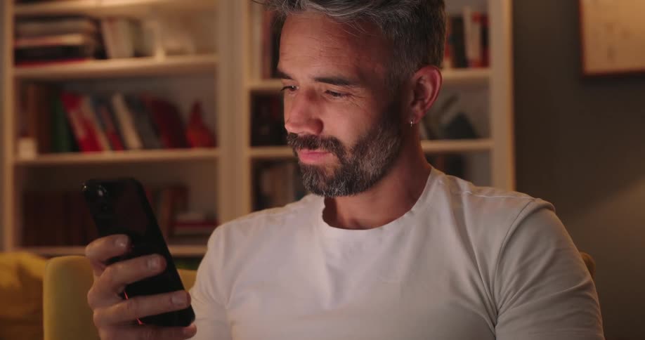 Man typing on phone