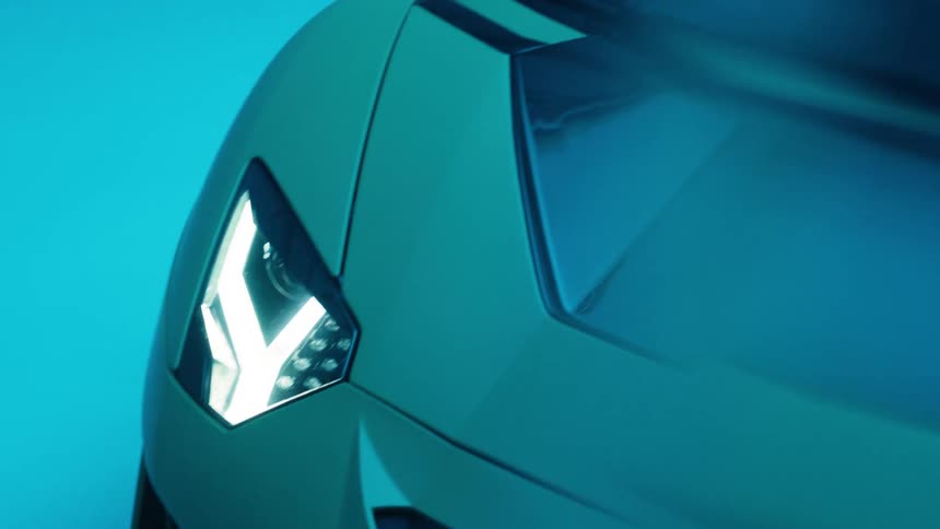 A sports car in a place with flashing lights